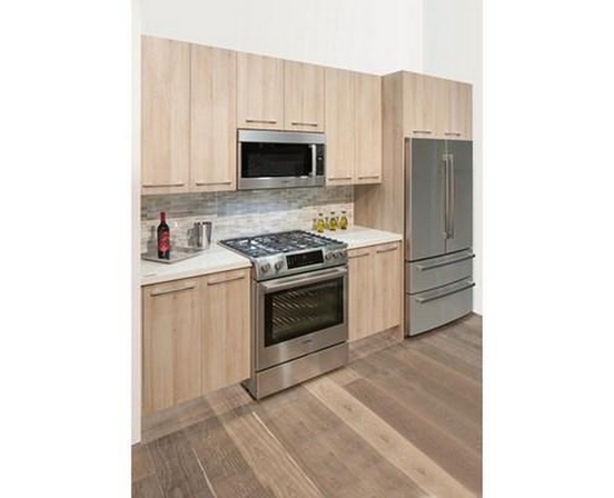 Bosch 30-Inch 300 Series Over-The-Range Microwave With Left Side Opening Door - HMV3054C