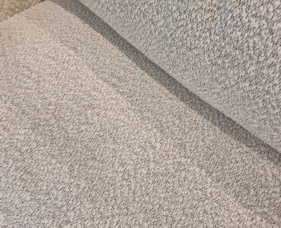 Sectional sofa with feather cushions