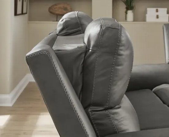 Leather combo reclining sofa