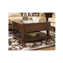 T697-0 - Porter Coffee Table with Lift Top by Ashley