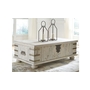 T757-9 - Carynhurst Coffee Table with Lift Top by Ashley