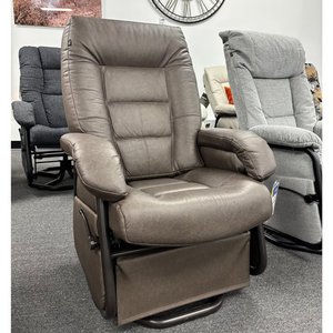 Fauteuil sur billes inclinable berçant et pivotant en cuir de Pel